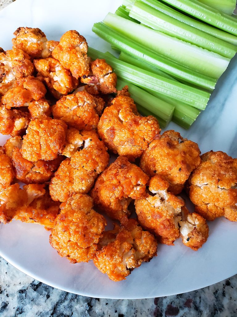 Baked Buffalo Cauliflower Bites - Noshing to Talk About